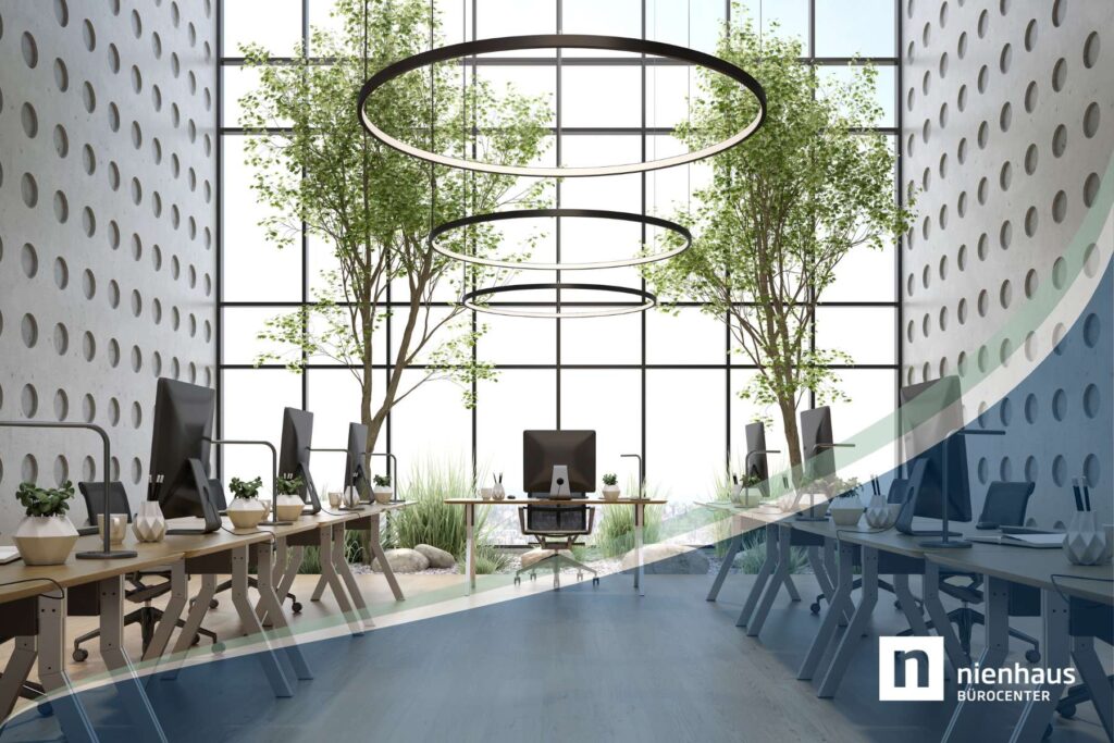 Modernes New Work Büro im biophilen Design mit Pflanzen auf den Tischen, einem künstlichen Garten und zwei Bäumen im Hintergrund.